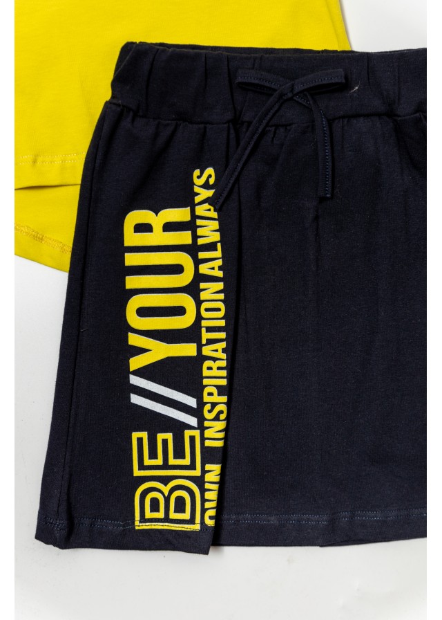 Παιδικό σετ με  αμάνικο μπλουζάκι be your own inspiration σε κίτρινο χρώμα και μαύρη φούστα