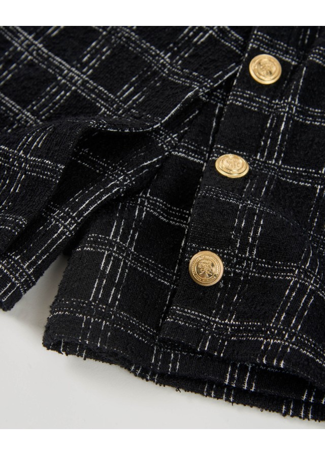 Παιδική φούστα-σορτς Nath με χρυσές λεπτομέρειες σε μαύρο χρώμα